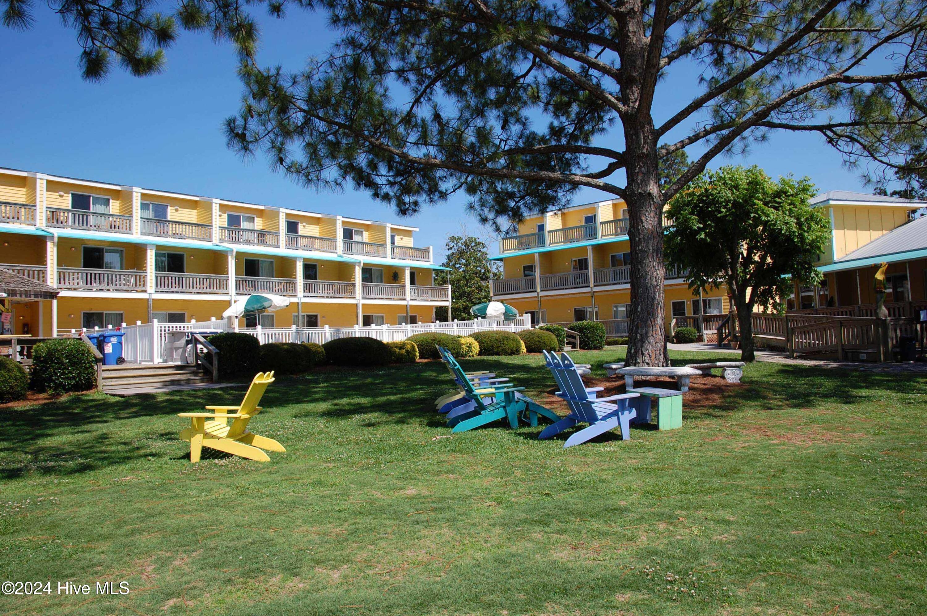 Located on the harbor in Oriental, NC, the Oriental Marina and Inn condotel offers a unique investment in coastal living. Each unit combines the convenience of a hotel with the benefits of a condo, featuring a kitchenette, living area with a sofa bed, a bedroom with two queen beds, and both a full and half bath. Amenities include a Tiki Bar, a pool and on-site Toucan restaurant, offering guests a complete, relaxing experience. Managed as a rental-only motel program, the condotel prohibits permanent residence, allowing no more than 45 consecutive days of stay per person in any year. This investment offers a low-maintenance, turnkey approach, blending financial returns with the charm of coastal life in Oriental.