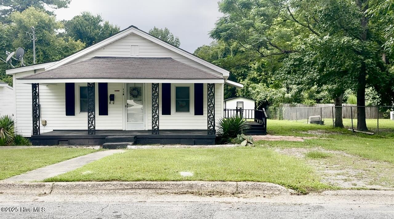 THIS WELL MAINTAINED, WELCOMING HOME IS READY!  From The Covered Inviting Front Porch, you enter into the Cozy & Comfortable Family LR!  AND there are 3 BRs, 1 Full & Spacious BA., plus a Large Open Kit. & Breakfast Eating Area.  OR if you need more than just a Breakfast area, there is an Open Attached Large & Most Convenient Space you can use for your more sizable Dining purposes.  OR it also makes for a great Family Den!  WOW!  And there is an agreeable Laundry/Mud Rm that takes you to the very generous backyard.   And here are ''some'' of the improvements Sellers wanted & decided to do:  New Stove, Vent Hood & Refrigerator, New BA Vanity, Tub & Toilet, All NEW Vinyl Flooring, All rooms painted & much more!  Just give us a call & make that appointment now to view this HAPPY HOME AND YOU WILL BE HAPPY YOU DID!!