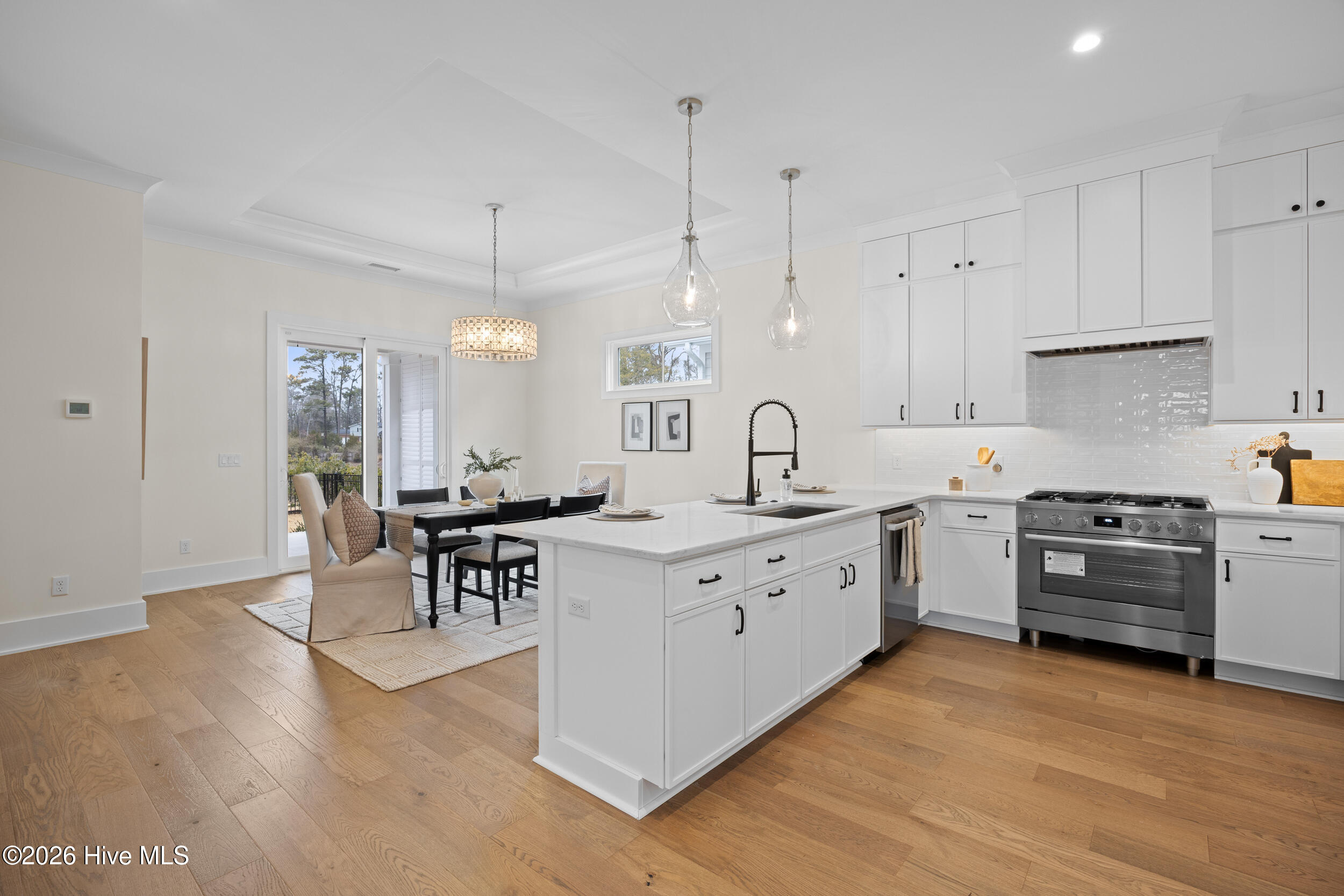 Kitchen opening to dining area