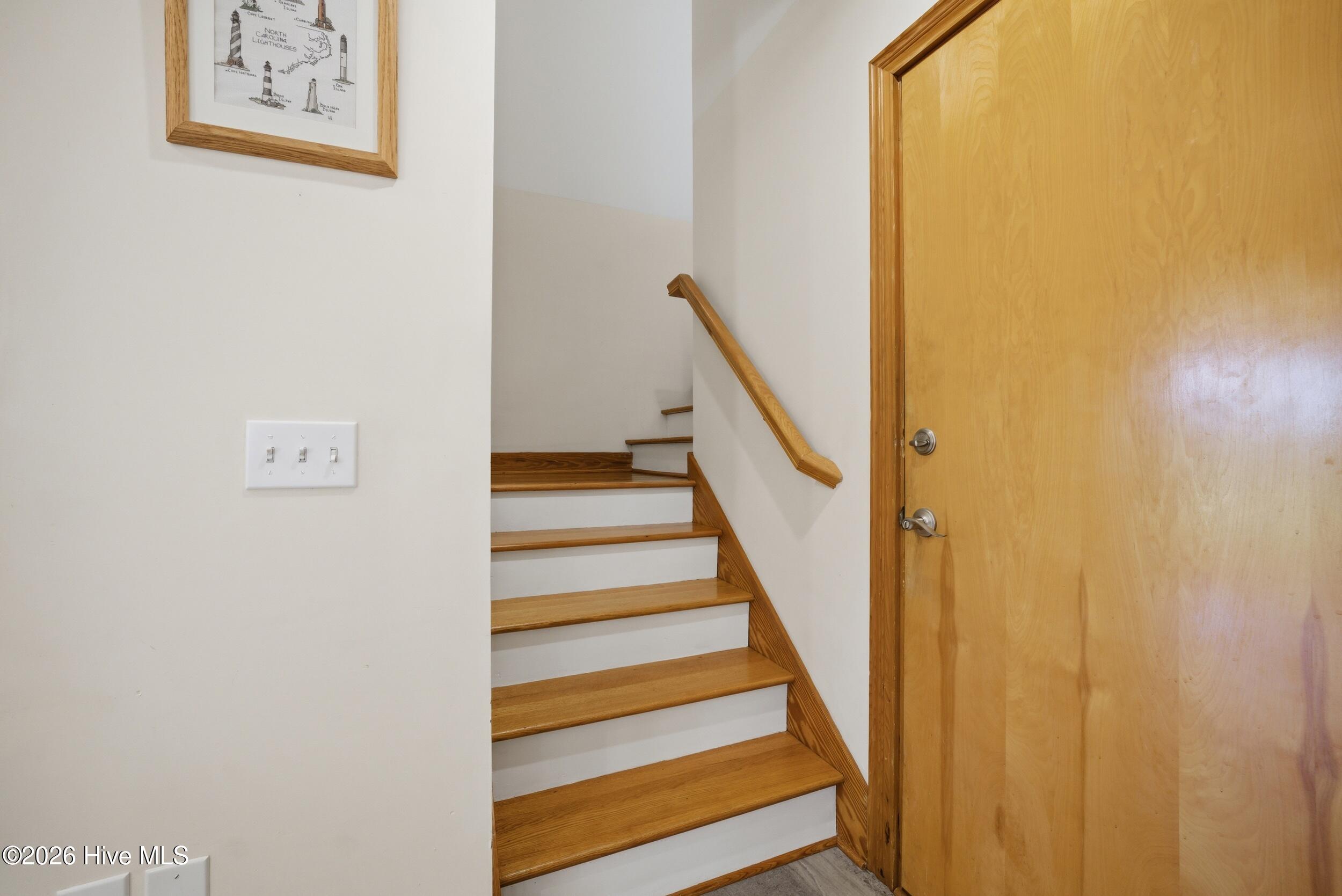 2nd set of stairs to FROG off of kitchen