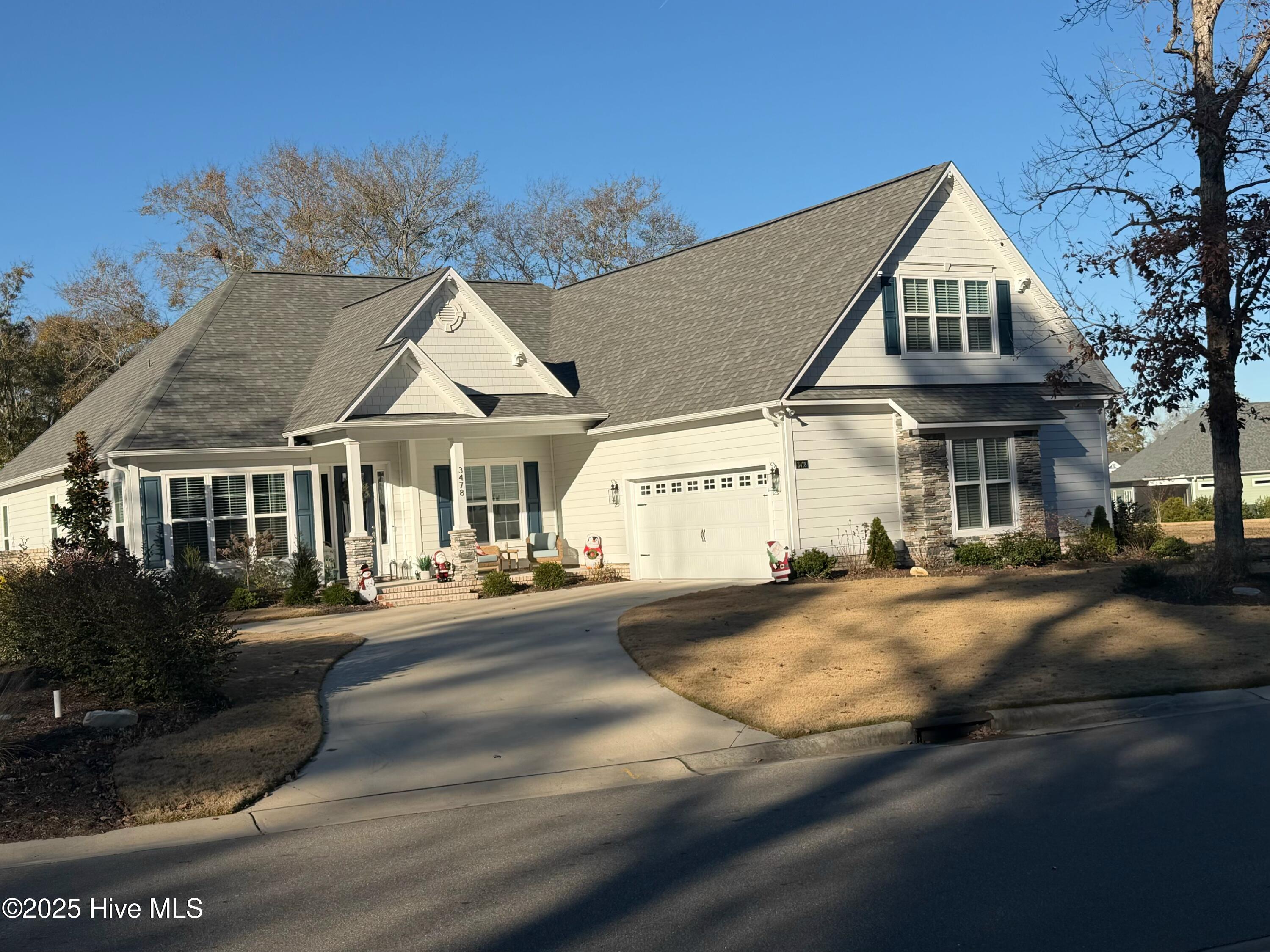 Experience relaxed luxury living in The Bluffs on the Cape Fear, Leland's premier gated coastal community. 3478 Belle Meade Way has been thoughtfully upgraded throughout, offering fresh finishes, new fixtures, and a warm, inviting style.Step inside to soaring vaulted and tray ceilings, rich hardwood floors, wainscoting, and sunlight filling every room. The chef-inspired kitchen is a true centerpiece featuring upgraded quartz countertops, a cast-iron farmhouse sink, upscale Cafe range, and a Samsung Bespoke smart refrigerator that conveys. The living room centers around a beautiful fireplace with custom built-ins, and opens to an enclosed lanai and a newly added 20x28 ft patio - both perfect spots to enjoy peaceful pond views, gentle breezes, and lush landscaping.The owner's suite feels like a private coastal retreat, complete with large windows overlooking the backyard, a custom closet system, and a Samsung Frame TV that stays. The spa-like bath offers a zero-entry tiled shower, upgraded fixtures, and a private door to the laundry room with custom shelving.Smart-home comforts include WiFi-enabled garage access, multi-zone HVAC, sprinkler system, Amazon integration, a full-house generator, Low-E windows, radiant barrier roof decking, and a tankless water heater. The oversized insulated garage, complete with a golf cart bay, adds everyday convenience in this golf cart-friendly neighborhood.Living at The Bluffs means enjoying a lifestyle shaped by the river and the sea: a private 50-slip marina, riverfront park, saltwater resort pool and clubhouse, private Oak Island beach club, tennis and pickleball courts, stocked lake, walking trails, RV/boat storage, and an upcoming fitness & wellness center.All just 15 minutes from historic Wilmington.This is coastal Carolina living at its best - elegant, easygoing, and ready to welcome you home.