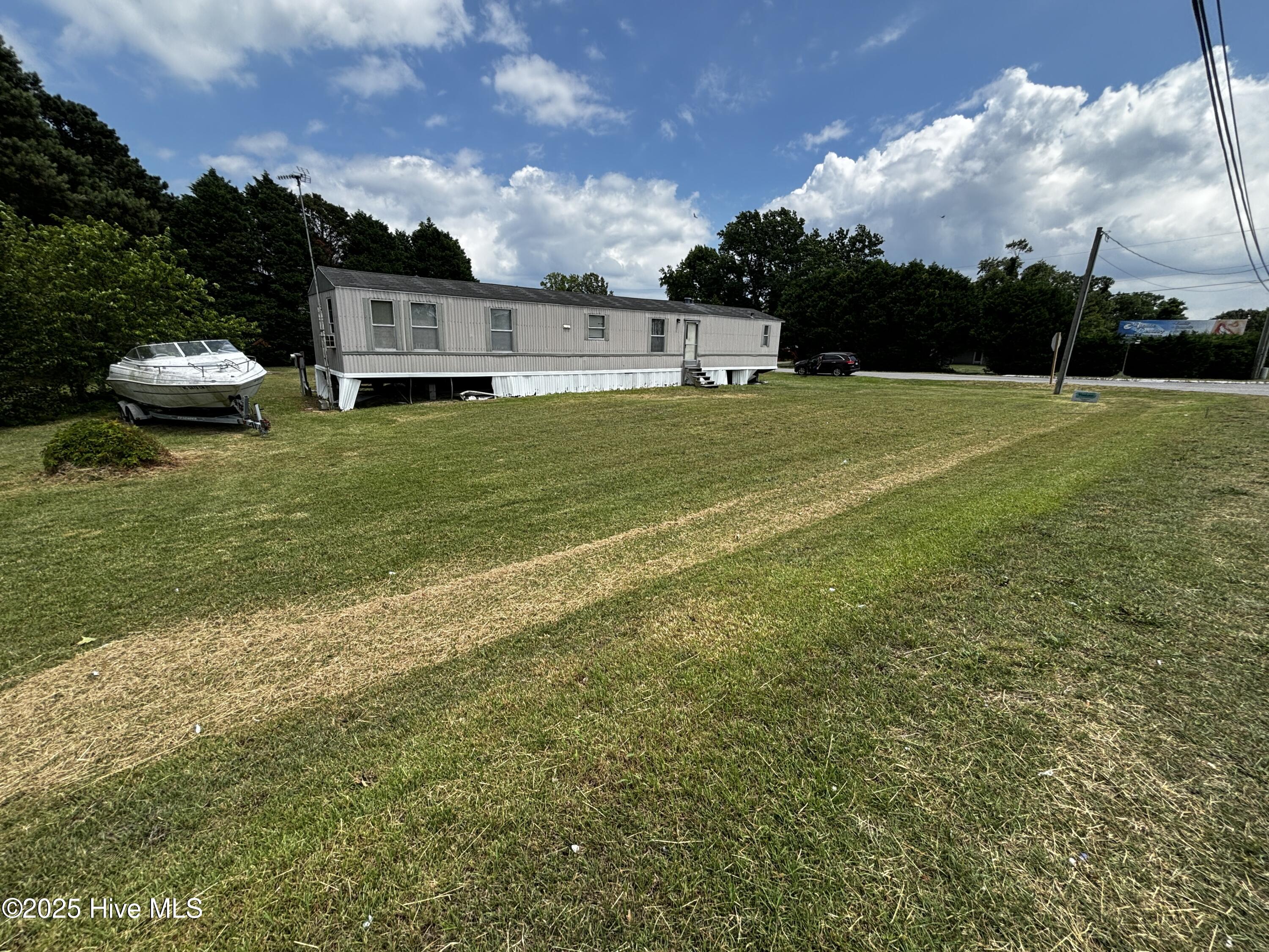 Exterior photo of 101 Edgewater Drive, Grandy, NC 27939. MLS: 100590461