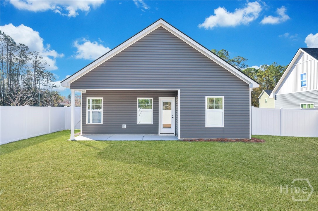 PHOTOS OF A PREVIOUSLY BUILT BRINSON PLAN BY LAWRENCE ALEXANDER HOMES.