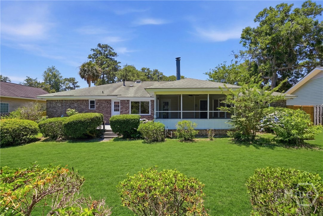 Screened porch with tile floor is perfect for enjoying this weather