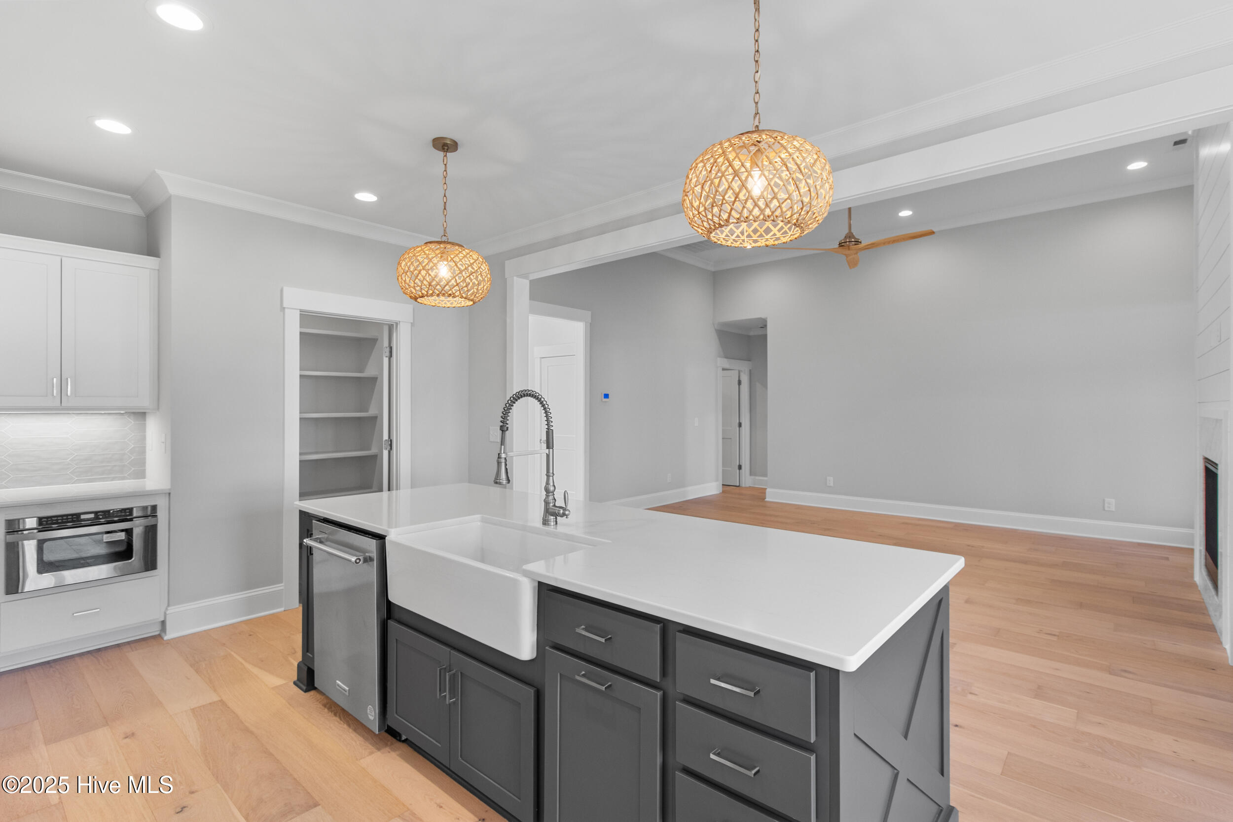 Kitchen opening to living area