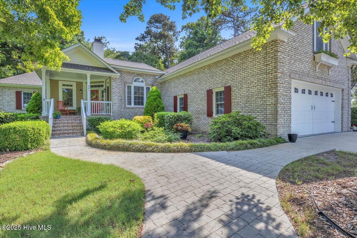 301 Wisteria Way, Caswell Beach, NC 28465 – photo 3: 05-Final 301 Wisteria Way Caswell Beach-