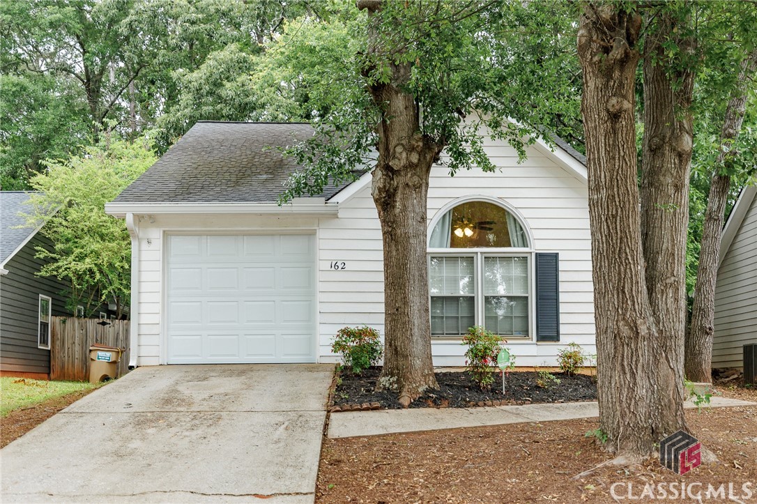 Welcome to this delightful 3-bedroom, 2-bath home in the popular Wakefield neighborhood. Perfectly located just minutes from the UGA Vet School and all the Eastside conveniences—whether it's Kroger, Publix, or your favorite local restaurants, everything you need is right around the corner.Enjoy the ease of one-level living with an inviting, efficient layout featuring a smart split-bedroom design. The primary suite, complete with an ensuite bath, is thoughtfully situated on one side for added privacy, while the two additional bedrooms and full bath are tucked away on the opposite side. The spacious living room, with its airy vaulted ceilings, feels open and bright—ideal for both relaxing and entertaining.You’ll love the comfortable white kitchen with plenty of cabinetry for storage and solid, easy-care floors throughout—no carpet here! Step out back to enjoy a cute, fenced-in yard, perfect for pets or a little garden retreat.Whether you’re looking for a great investment opportunity or a cozy place to call your own, this home has it all!