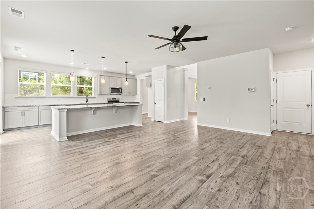 Open concept living area with tons of natural ligh