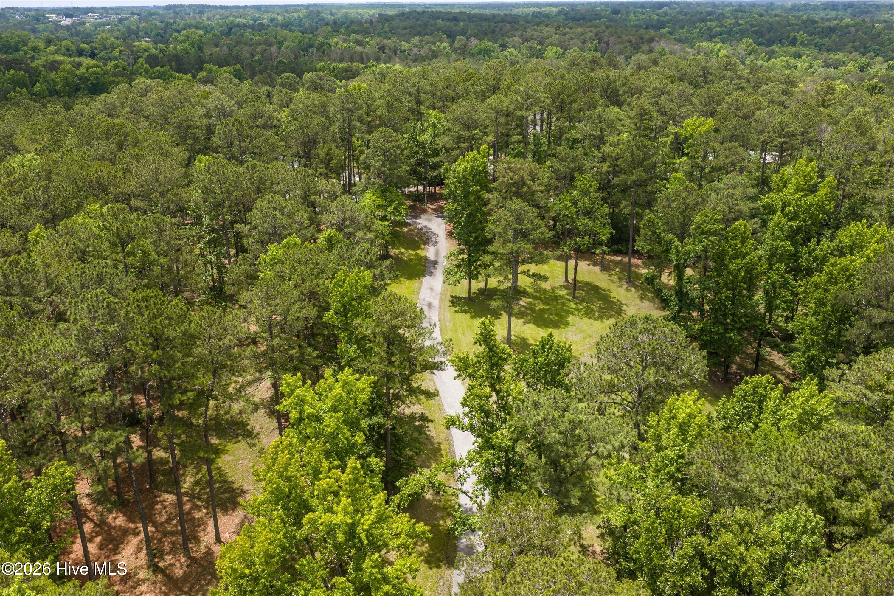 10.43 acres with long winding drive from main road