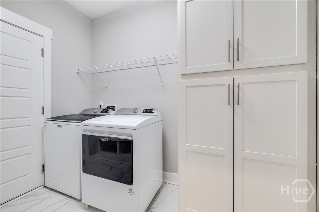 Laundry Room - Storage and double pantry (not shown)