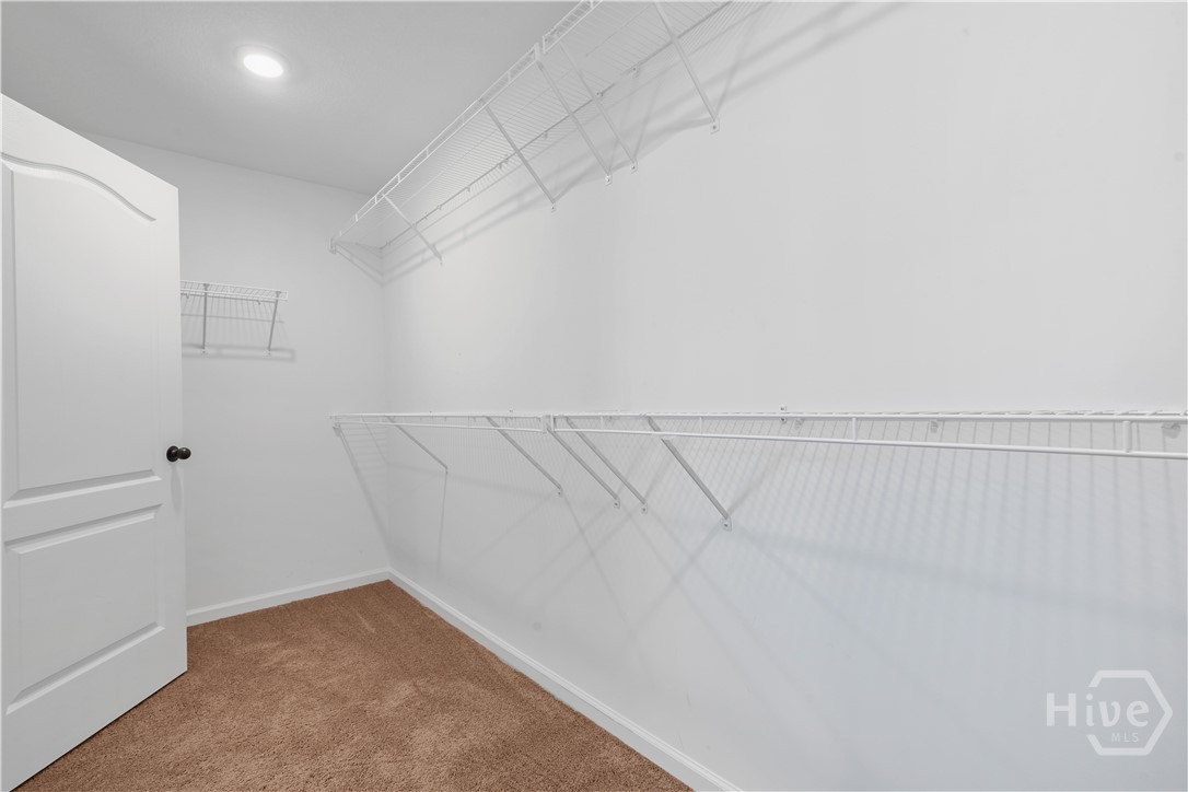 Upstairs Primary Walk In Closet