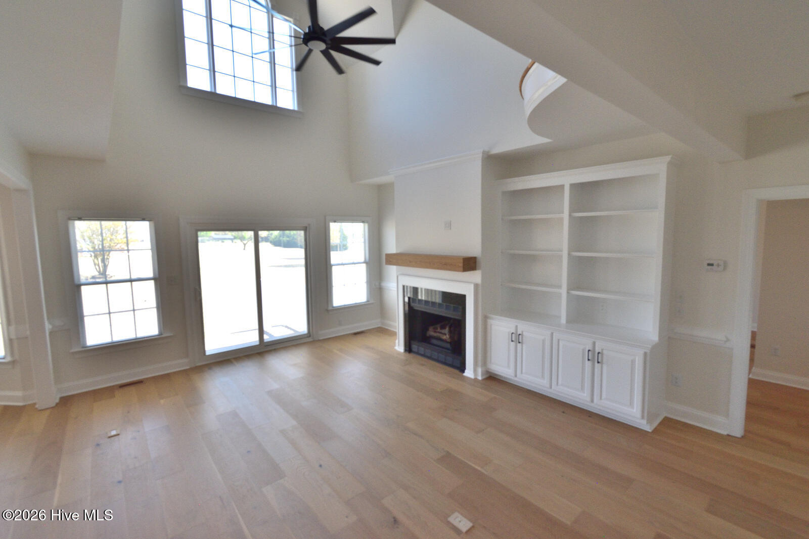 living room with built in bookcases