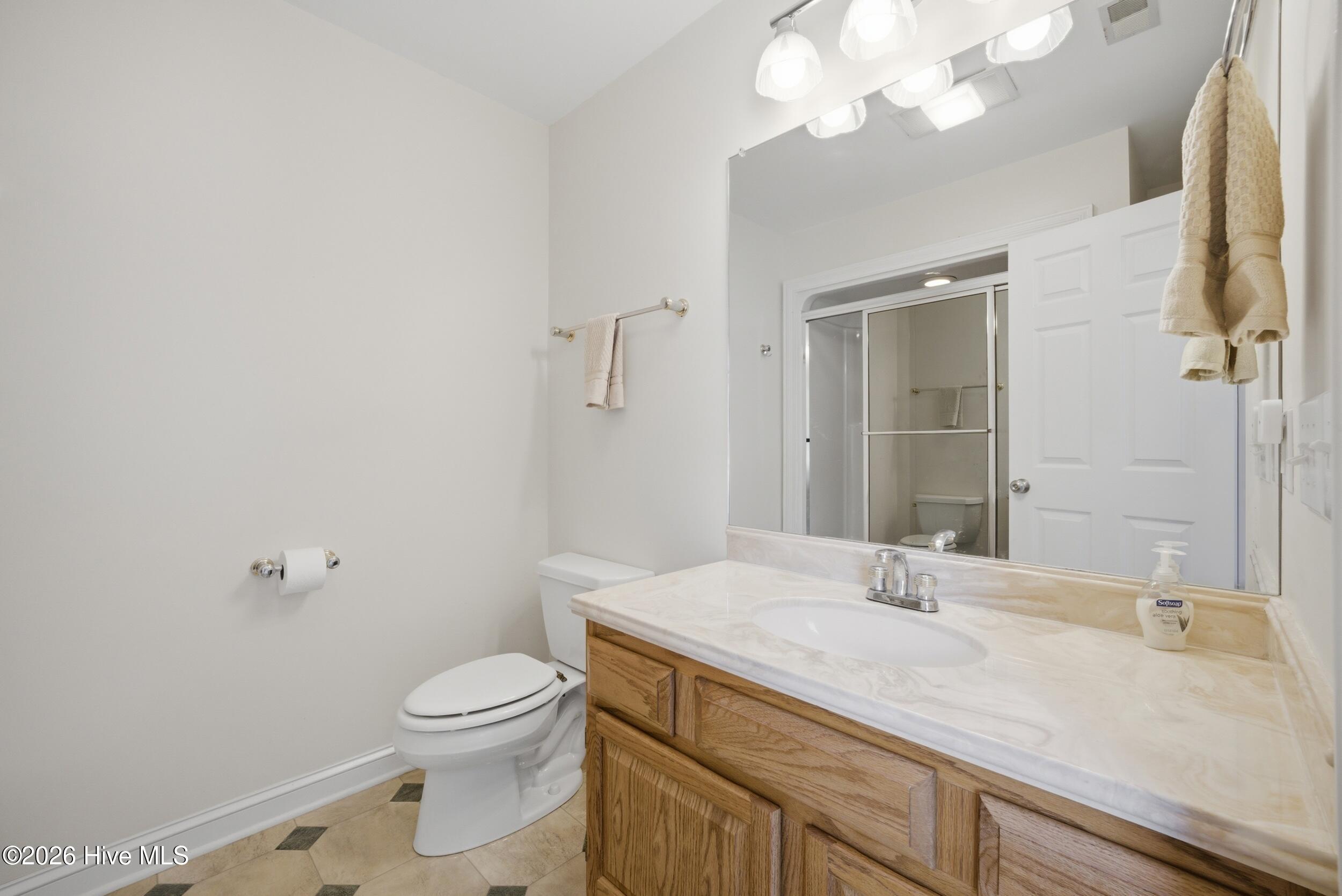 Bedroom 2's private full bath
