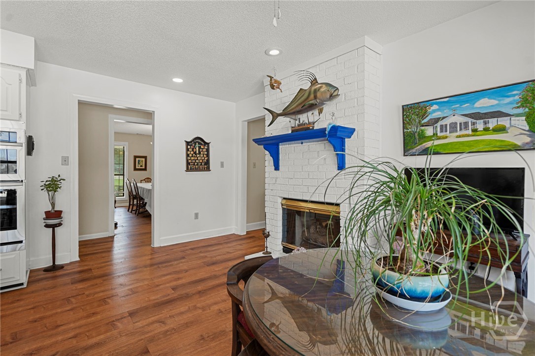 See thru fireplace between kitchen and living room