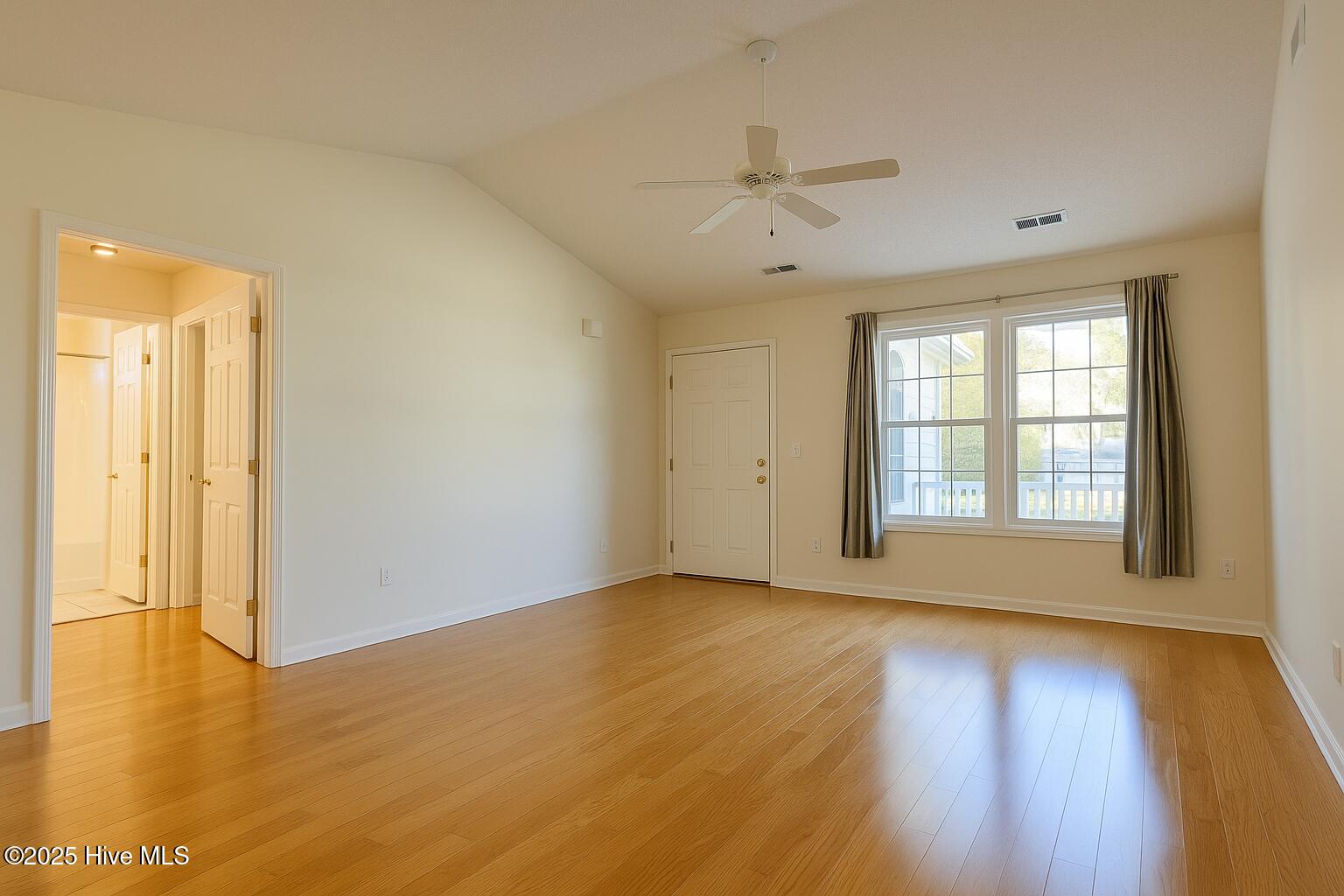9117 Landing Drive SW, Calabash, NC 28467 – photo 13: Spacious and Serene Living Room