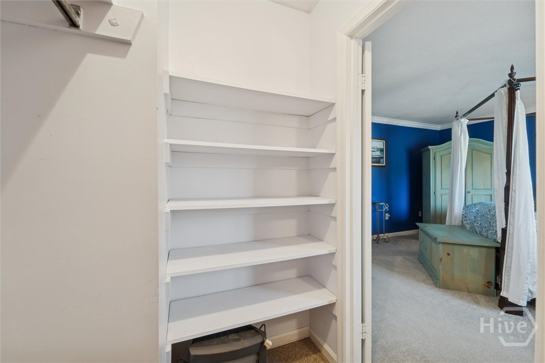 A walk-in closet completes the guest bedroom.