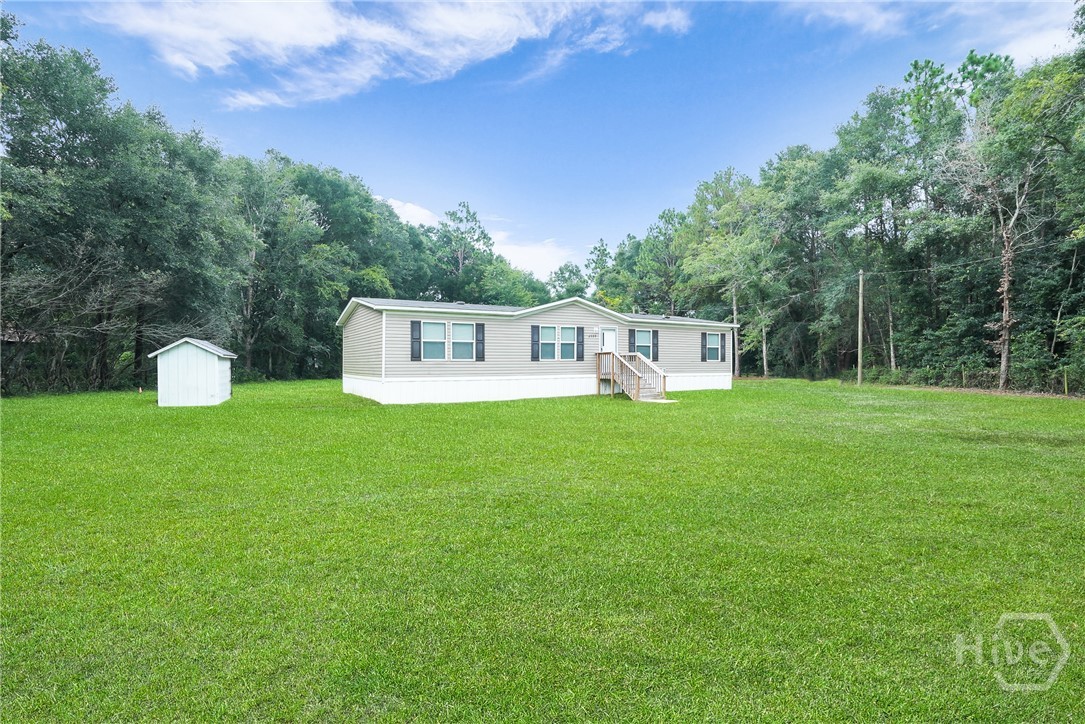 Side view of the home and yard
