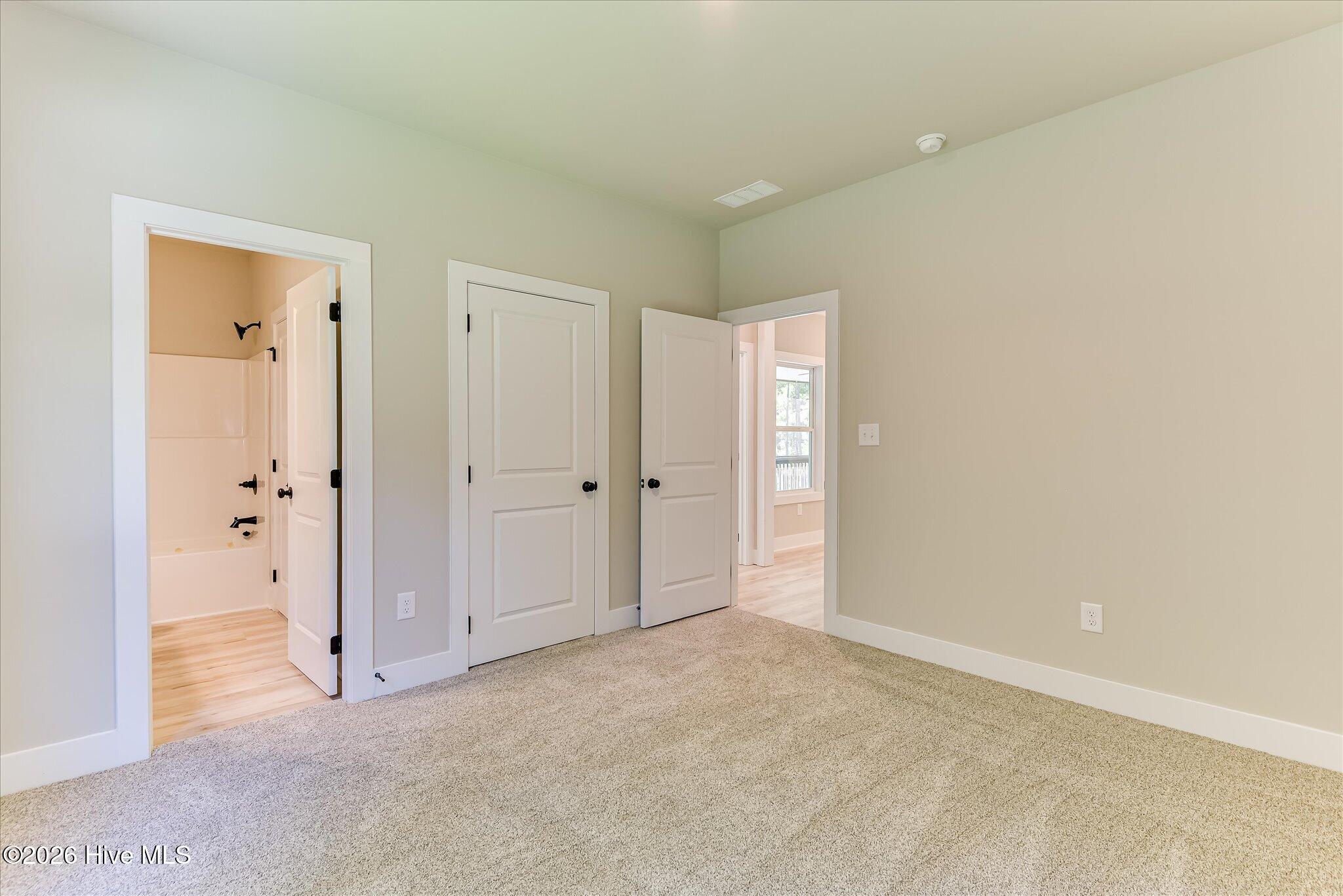 Bedroom 2 with shared access to full bathroom