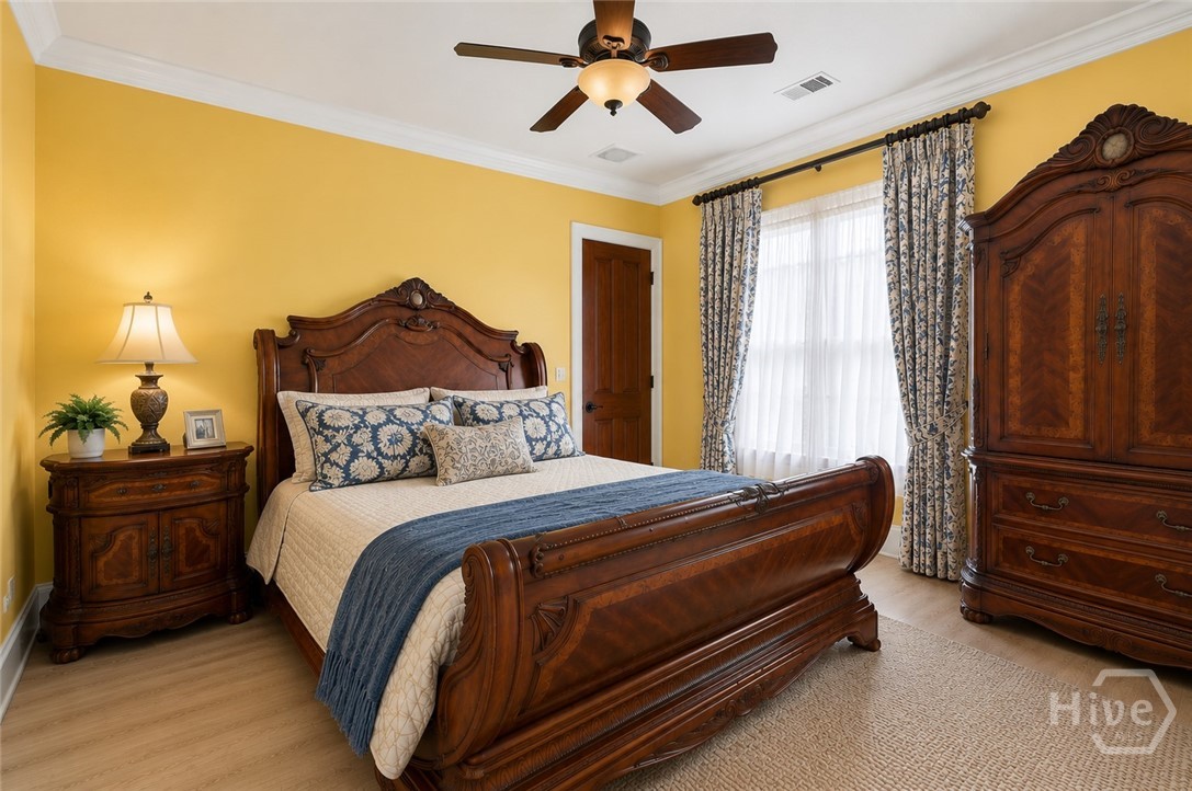 1st floor bedroom (could be 2nd owner's suite) Virtually staged. Ensuite bathroom on the left out of frame.