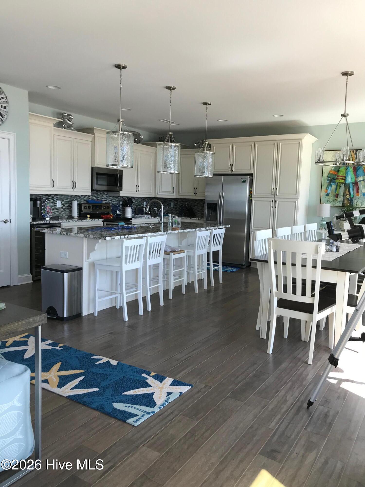 Exterior photo of 917 E Beach Drive, Oak Island, NC 28465. MLS: 100592177