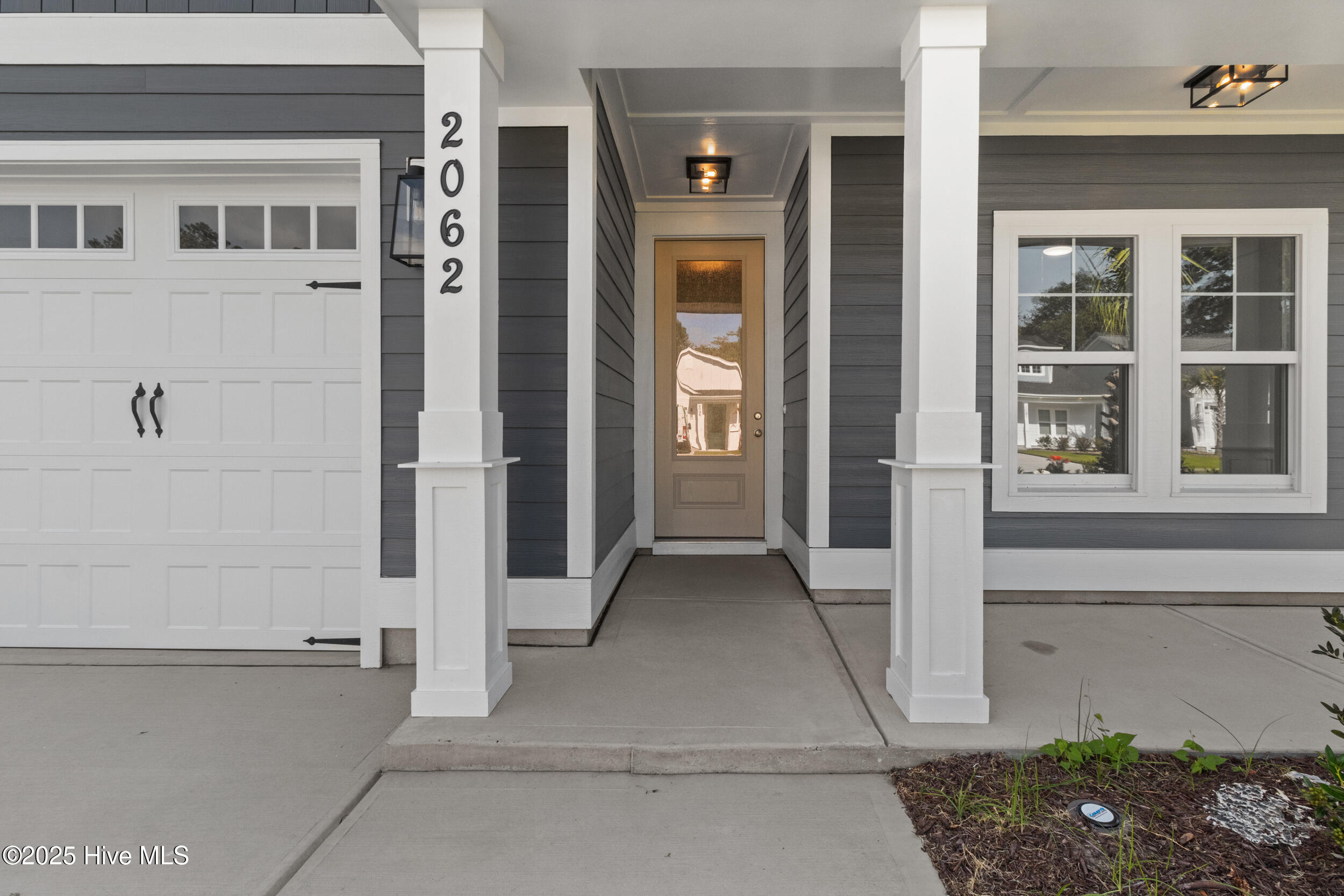 2062 Greenside Manor Drive SW, Ocean Isle Beach, NC 28469 – photo 7: 9_front entryway
