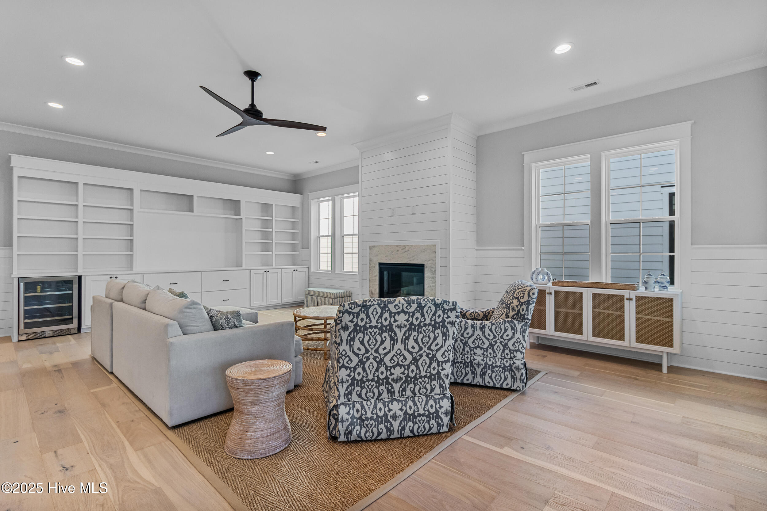 Living room with fire place and built-ins
