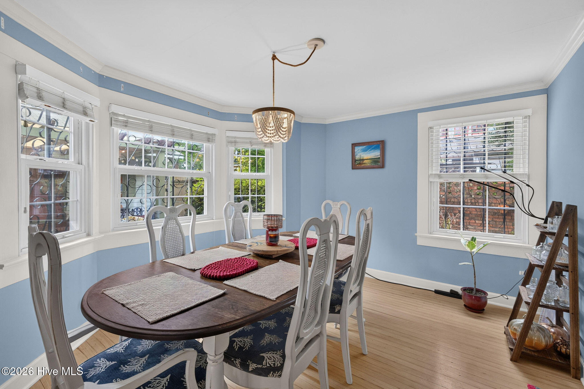 Formal dining room area filled with sun-light