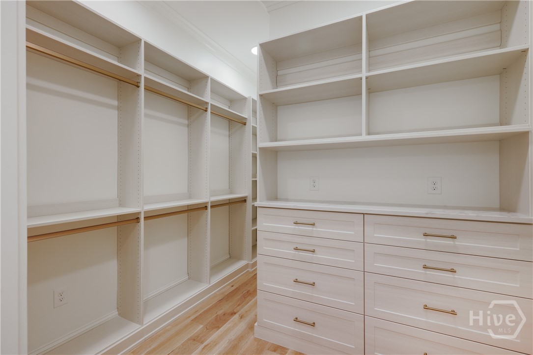 Primary Closet/Him