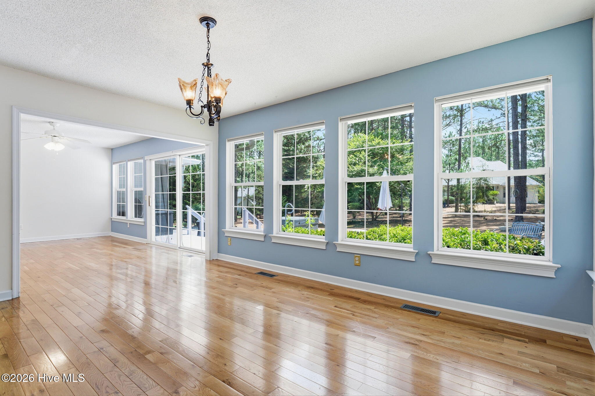 Two great entertaining or sitting areas in this back part of the home. Lots of open space.