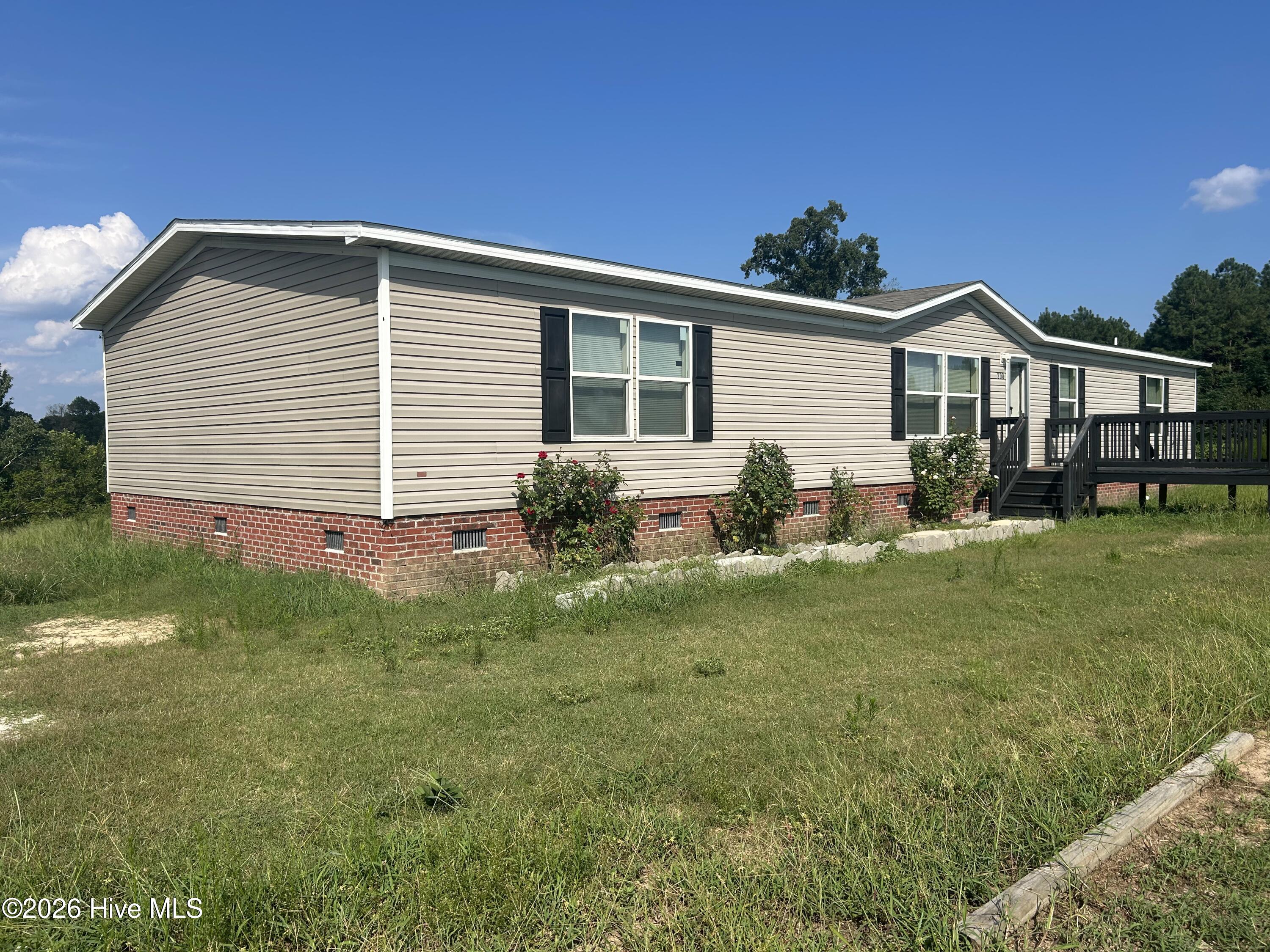 Exterior photo of 208 Grove Run Drive, Warsaw, NC 28398. MLS: 100603551