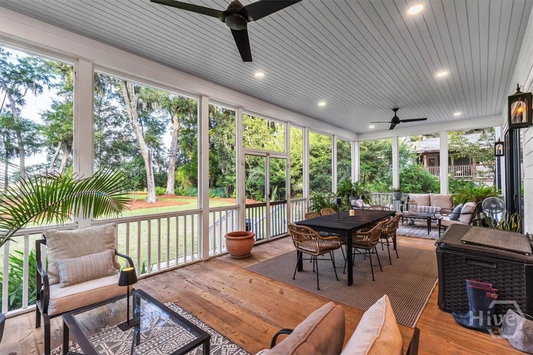 Enormous rear screened in porch, overlooking the rear yard and the Vernon River.