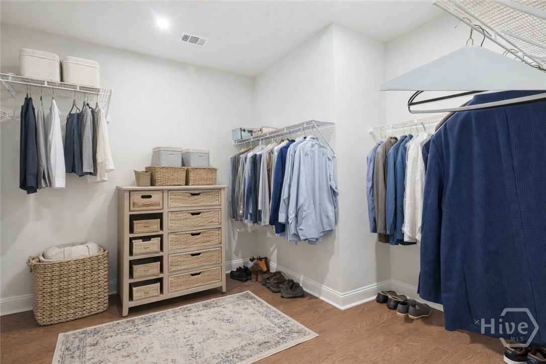 Primary closet - virtually staged