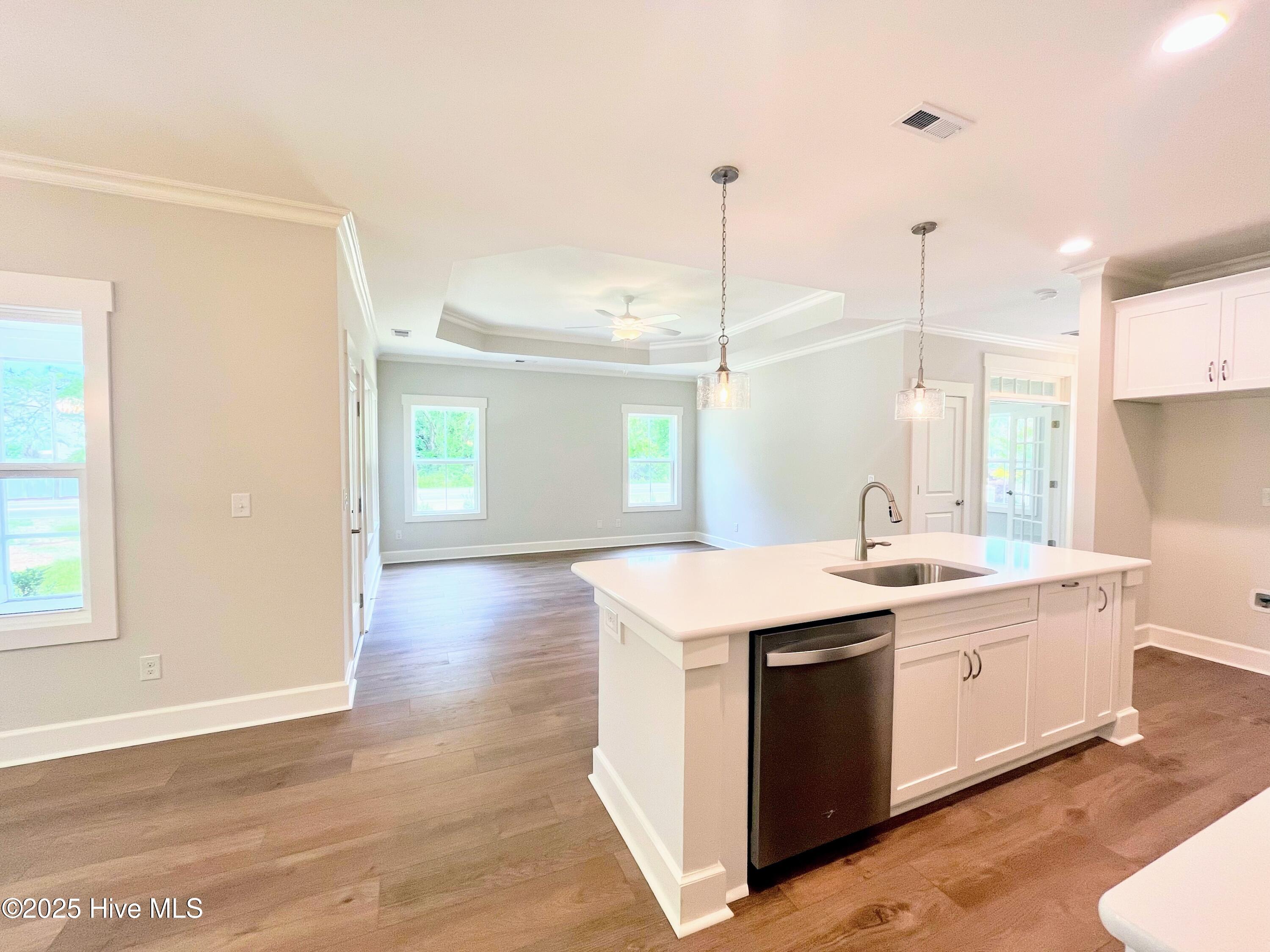 9002 Ocean Harbour Golf Club Road SW, Calabash, NC 28467 – photo 4: Kitchen & Living Room