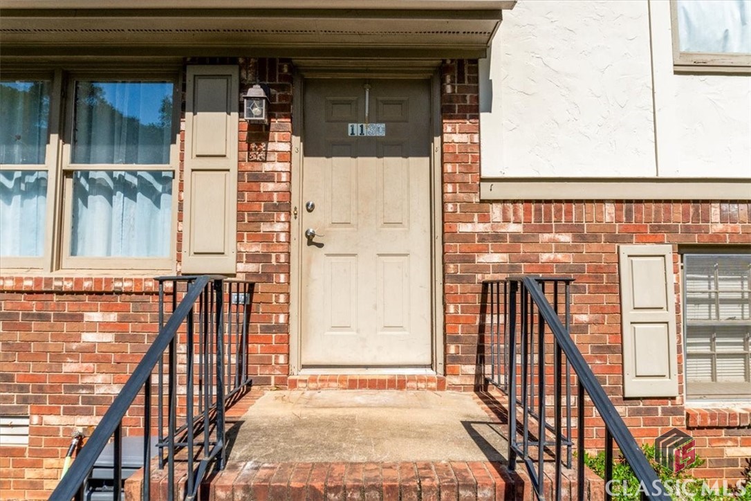 **Exceptional Opportunity in Oconee County!**Welcome to this charming split-level brick home featuring three bedrooms and two bathrooms. The owner's suite includes a private bathroom for added comfort. Enjoy a spacious living room with a cozy fireplace and high ceilings adorned with wood beams. The kitchen is roomy enough for a breakfast nook, and there’s a separate dining room for entertaining. This home also offers a two-car garage with extra storage space, all situated on a large, flat lot.Recent updates include a new storage building added in 2023.  Nestled in the peaceful Brookwood Estates neighborhood, you’ll be just minutes from highly-rated Oconee County schools, dining, and shopping. Don’t miss out on this wonderful opportunity!