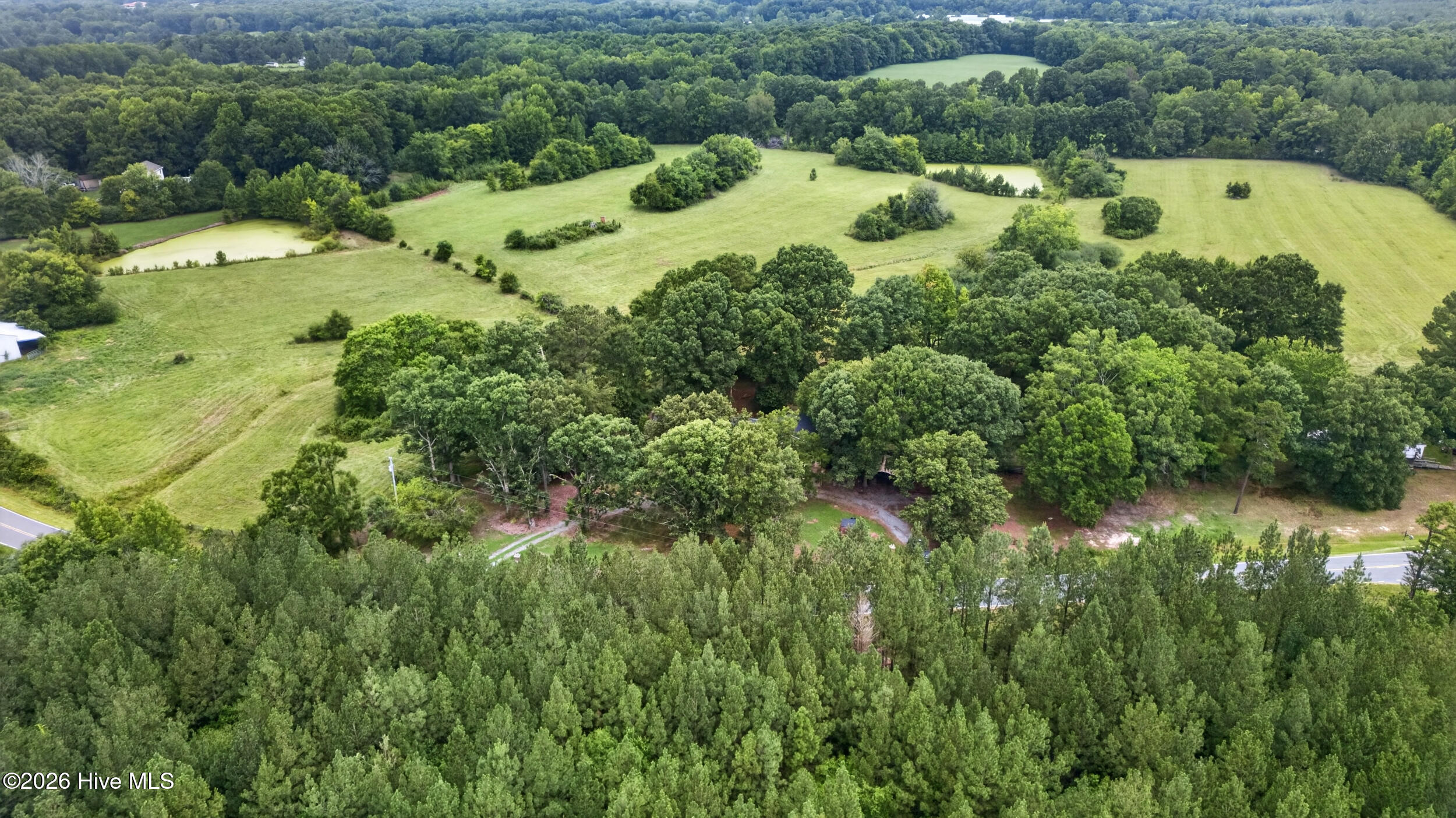 Exterior photo of 1400 Clyde Underwood Road, Siler City, NC 27344. MLS: 100596520