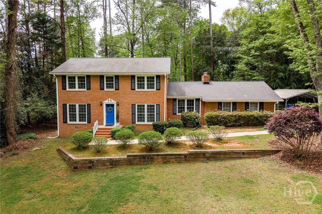 This 2900 sq ft home on a .51 acre lot perfectly blends timeless features with thoughtful updates! Sturdily built brick home features 4 large bedrooms, 3 baths with a spacious floor plan. Lots of storage space for all your needs! Cedar Creek is a quiet neighborhood with large established trees that create a serene canopy for walks, bike rides, and the ability to join a community pool. Conveniently located near stores, markets, and area schools. This East Athens neighborhood offers premier amenities!The home features a first floor bedroom with full bath and new toilet, kitchen with lots of cabinet space, lovely den and living room, and tiled recreation room with more storage space. Wood floors throughout the house provide a warm feel. Upstairs has three large bedrooms, with two full glass doors on the bath/showers; Primary bedroom includes two separate sinks. Newer floor in primary bedroom highlights the spaciousness. Because of the lot elevation and home setback, you have amazing privacy. The second floor may feel like you are nestled in a sunlit treehouse!Large windows throughout the house provide lots of natural light! Shaded, owner-maintained trees in the fully fenced backyard and concrete patio are ready for all of your outdoor needs!New features within the last 4 years: air conditioning, furnace, water heater, and Aeroseal cleaning of ductwork and vents