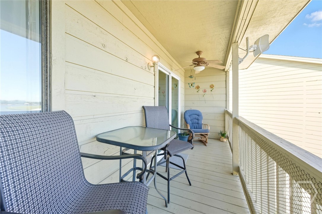 Outside relax on your covered balcony.