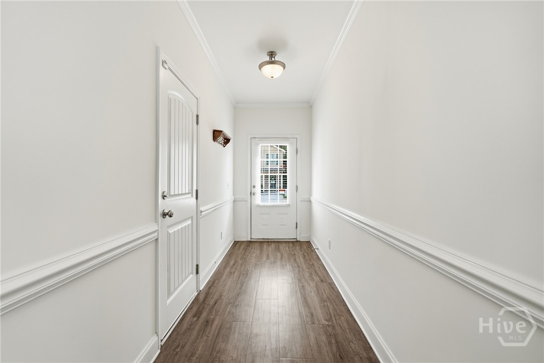 Light-filled, welcoming foyer entryway.