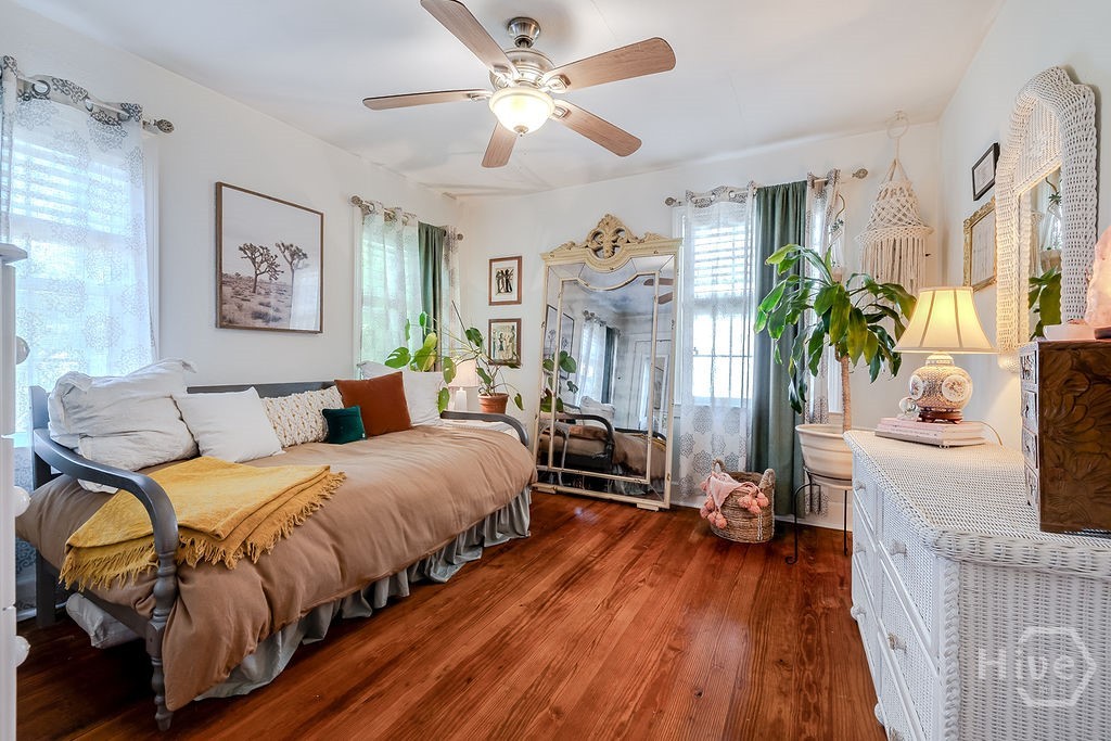 2nd bedroom with tons of natural light overlooking the back yard.