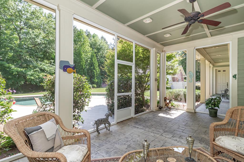 Screened in Back Patio w/ view of pool