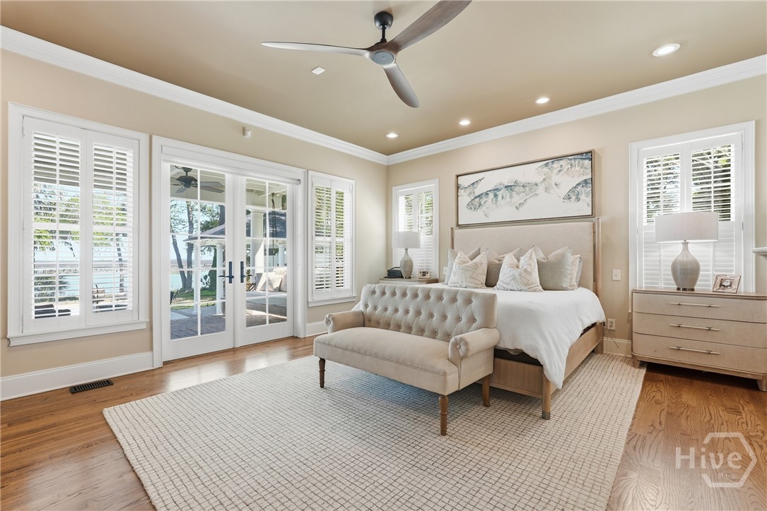 Primary suite with doors to covered porch