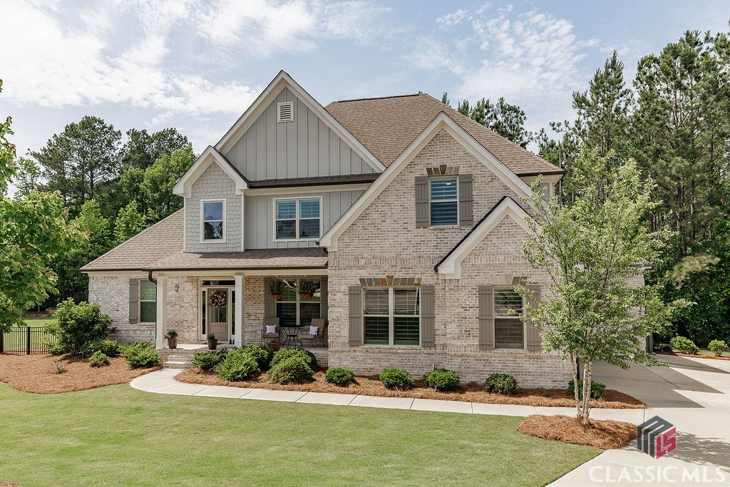 Stunning two-story home built in 2021, located on a quiet cul-de-sac in the highly desirable Enclave at Coldwater Creek in Watkinsville. The brick and stone exterior provides timeless curb appeal, and inside you’ll find a thoughtful open-concept layout. The main level features a welcoming foyer, formal dining room, and a soaring two-story family room with a fireplace and views of the private, fenced-in backyard. The kitchen offers a large island, walk-in pantry, stylish backsplash, and stainless steel appliances. The spacious primary suite is also on the main level and includes a trey ceiling, spa-like bath with a vessel tub, oversized shower, double vanity, and a generous walk-in closet. Upstairs are three additional bedrooms and two full bathrooms, along with excellent closet space throughout. Additional highlights include a 3-car garage prewired for an electric vehicle charger, a prewired security system, and a fantastic location just steps from Oconee County High School, with easy access to Publix, shopping, and dining. This is a rare opportunity to own a newer home in a top Oconee County neighborhood. ***SELLER HAS MOVED AND SAYS BRING ALL OFFERS!***