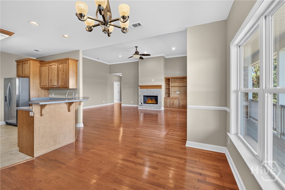 Dining space with kitchen and living room.