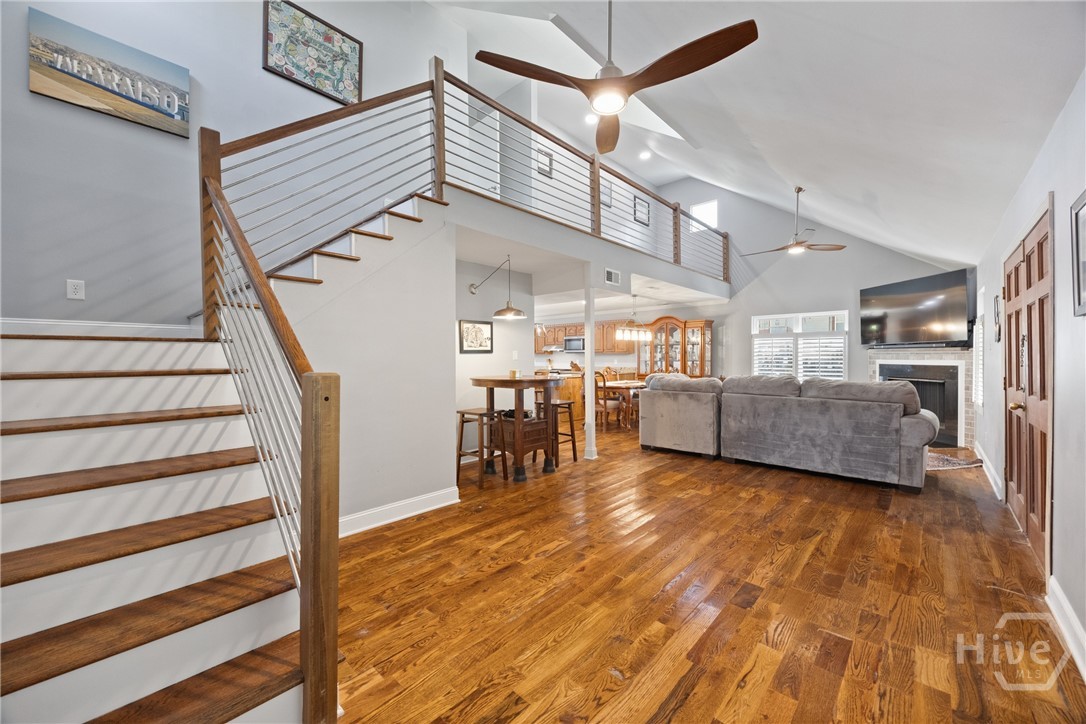 Spacious living area flowing seamlessly into dinin