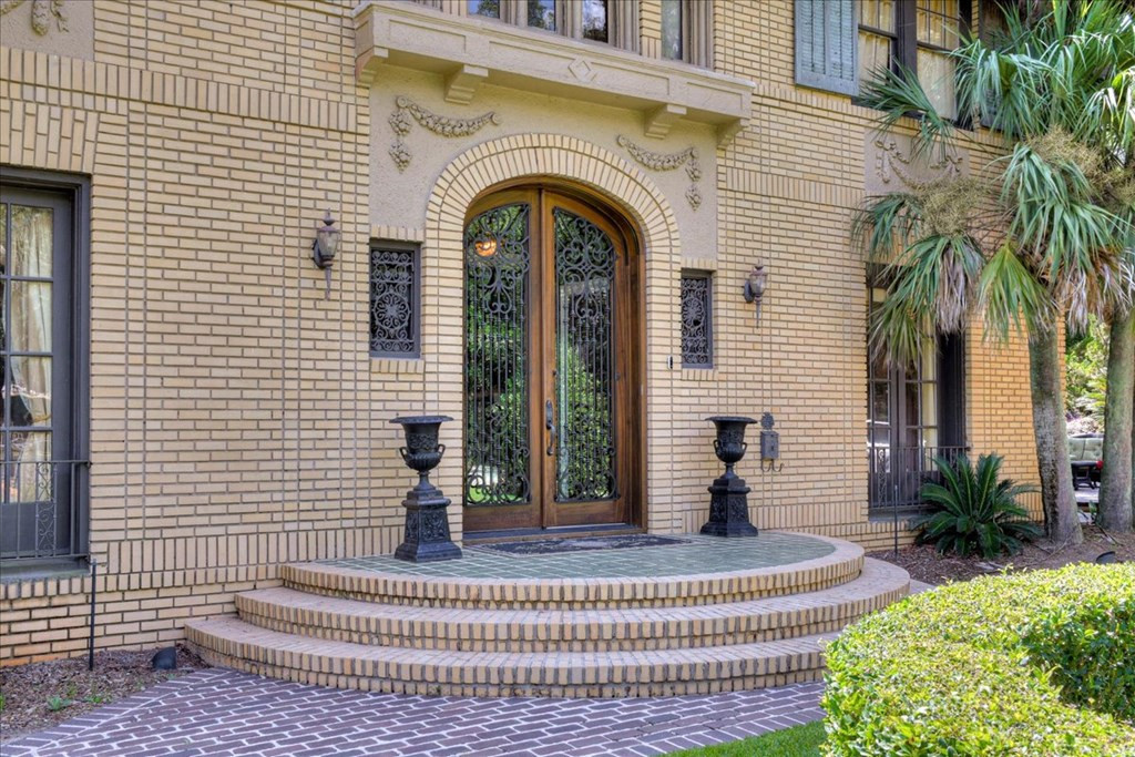 Impressive glass doors invite you to enter