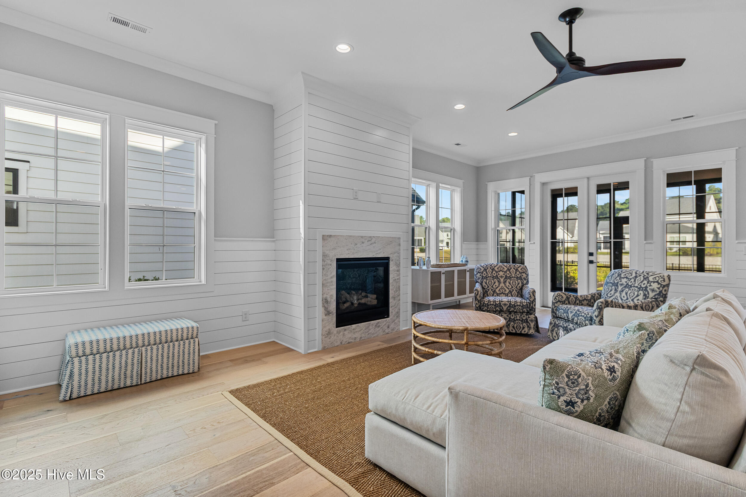 Living room with fire place and built-ins
