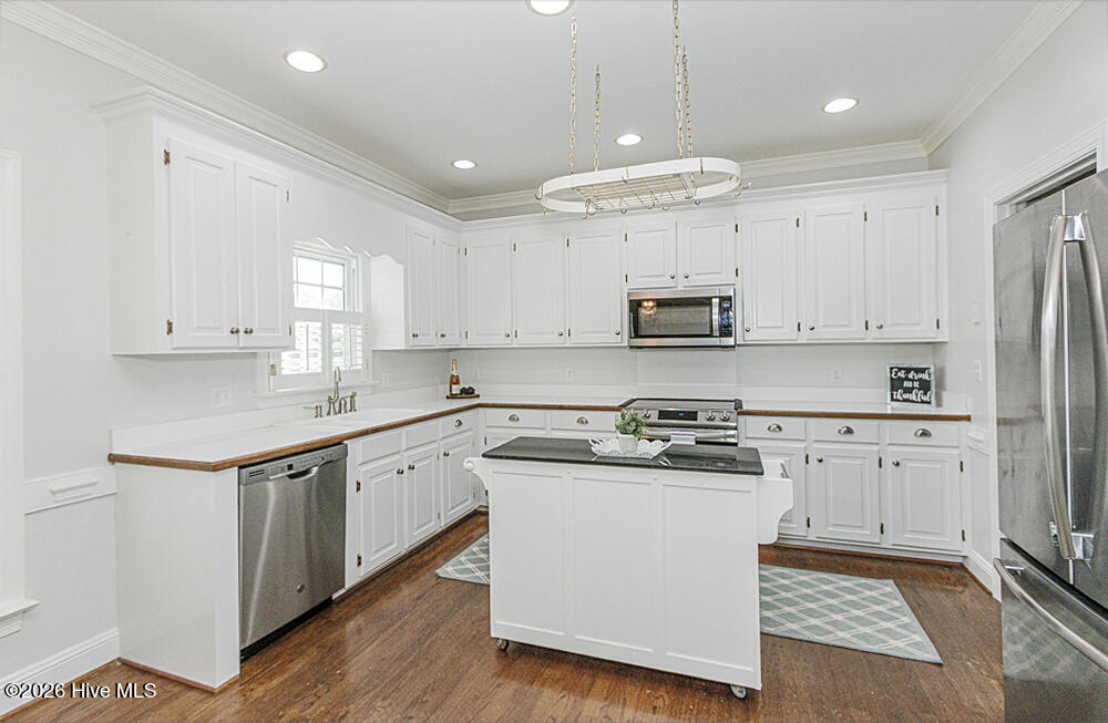 Large kitchen with stainless steel appliances