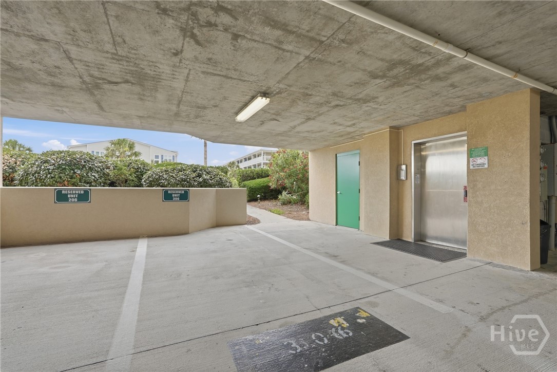 Assigned covered parking space next to Elevator en