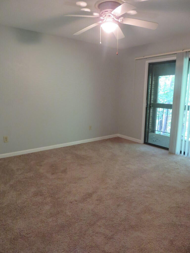 PRE350 Primary Bedroom with view to balc