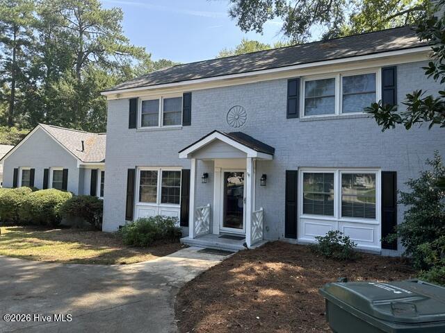 Beautiful four bedroom two and a half bath, painted brick home in the lovely Forest Hills. Three bedrooms on the second floor, Massive Master Suite on the lower level. Laundry room on lower level. Separate attached in law suite with a private entry. Hardwood floors and a lovely sunroom.